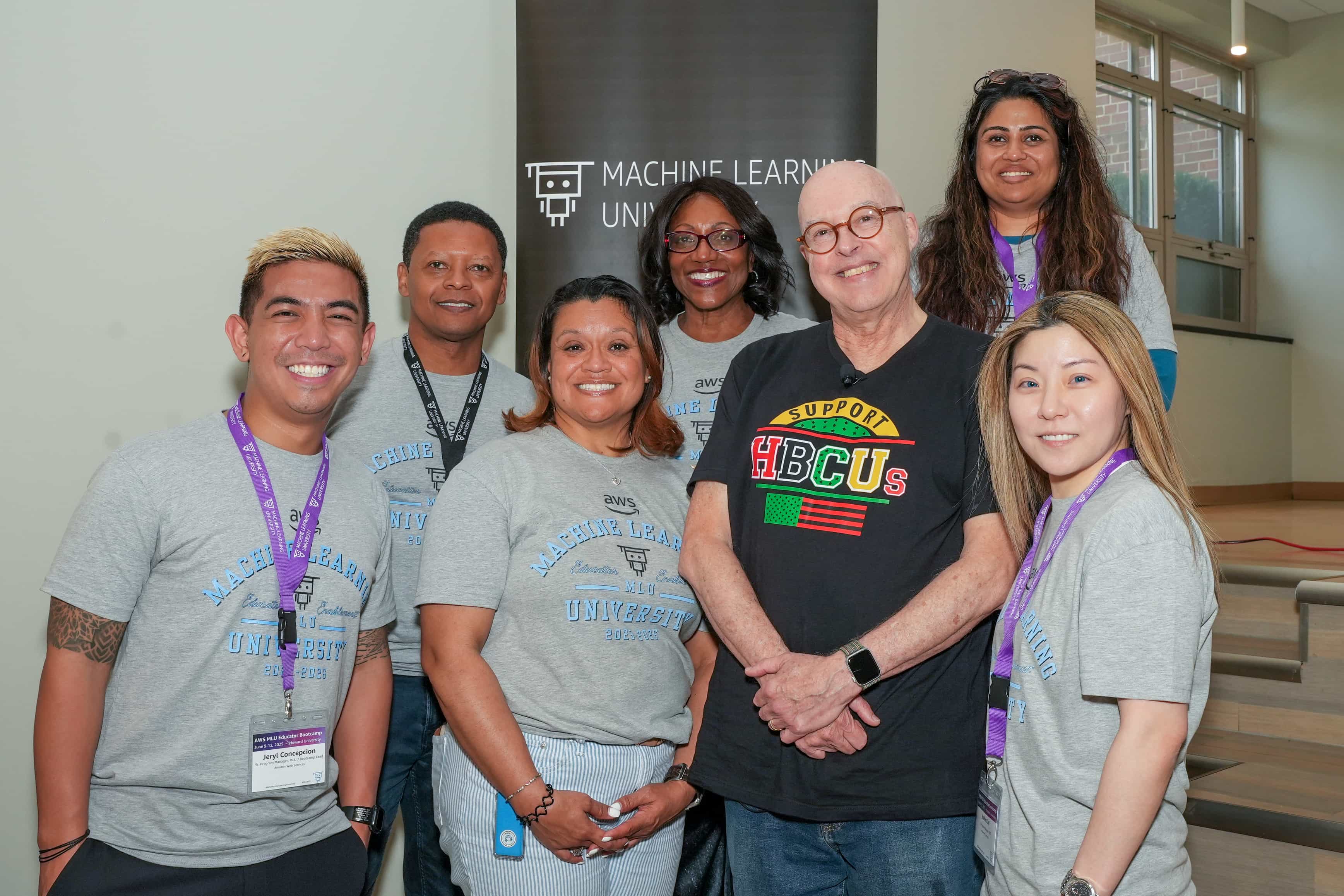 Group photo of seven MLU employees smiling at camera